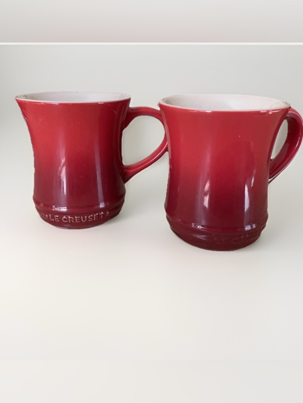 Two le creuset coffee mugs